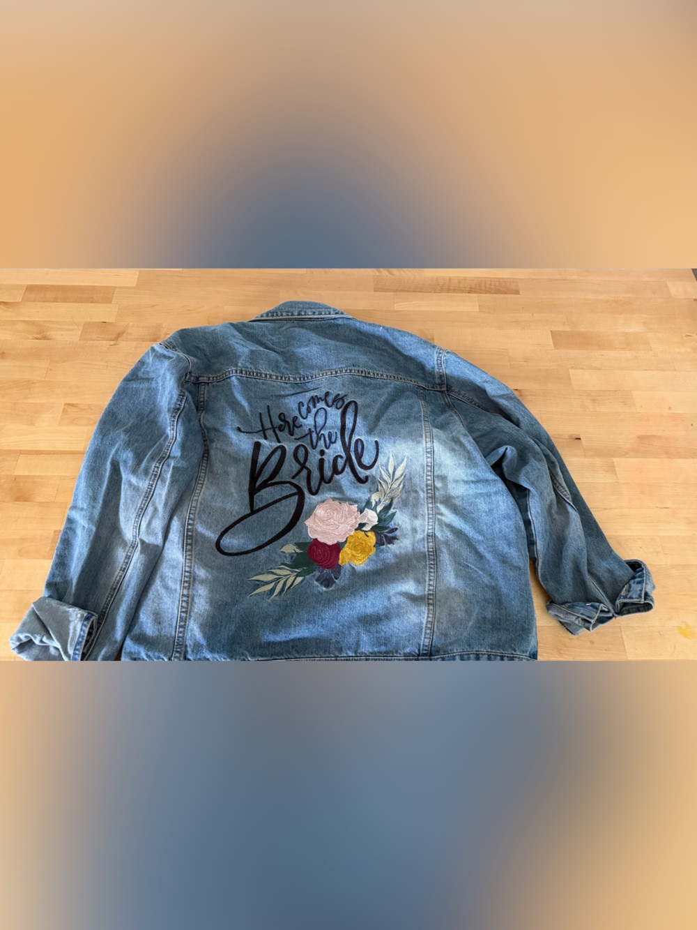Embroidered Light Wash Denim Jacket with Script Back